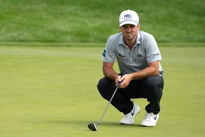Denny McCarthy lines up a putt on the second green during the first round of the U.S. Open golf tournament.
